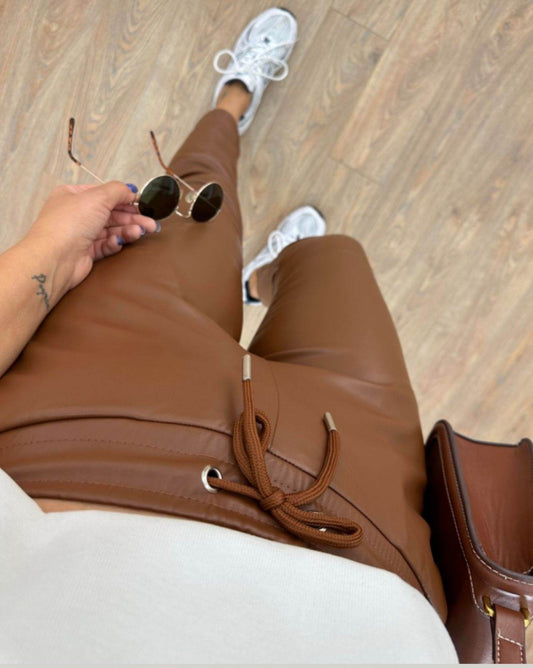 Tan Tapered fit faux leather pants - oneinmelon