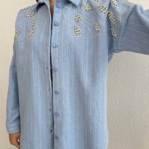 blue flannel shirt with embellishment